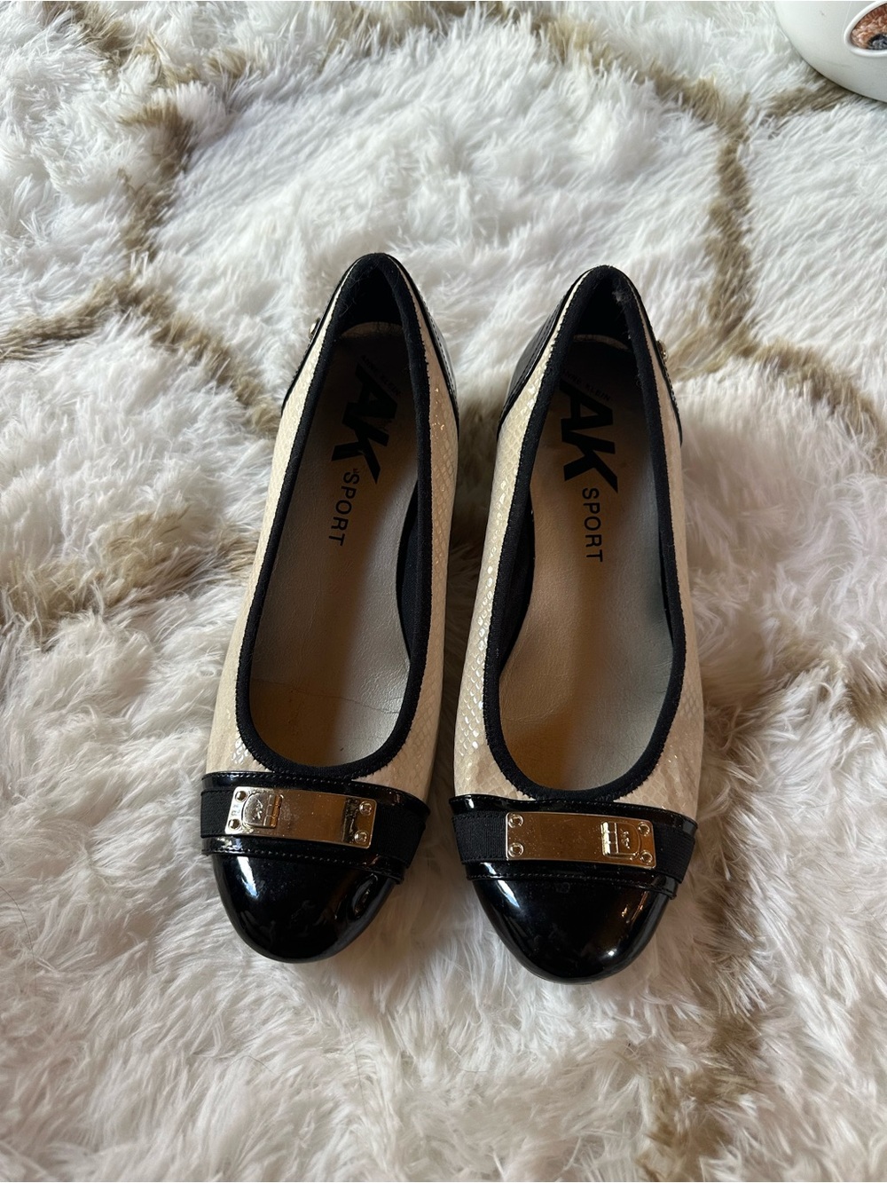 Anne Klein Two-Tone Black and Cream Cap-Toe Ballet Flats with Gold Plate